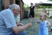 Grandpa and Annabelle share an ice lolly